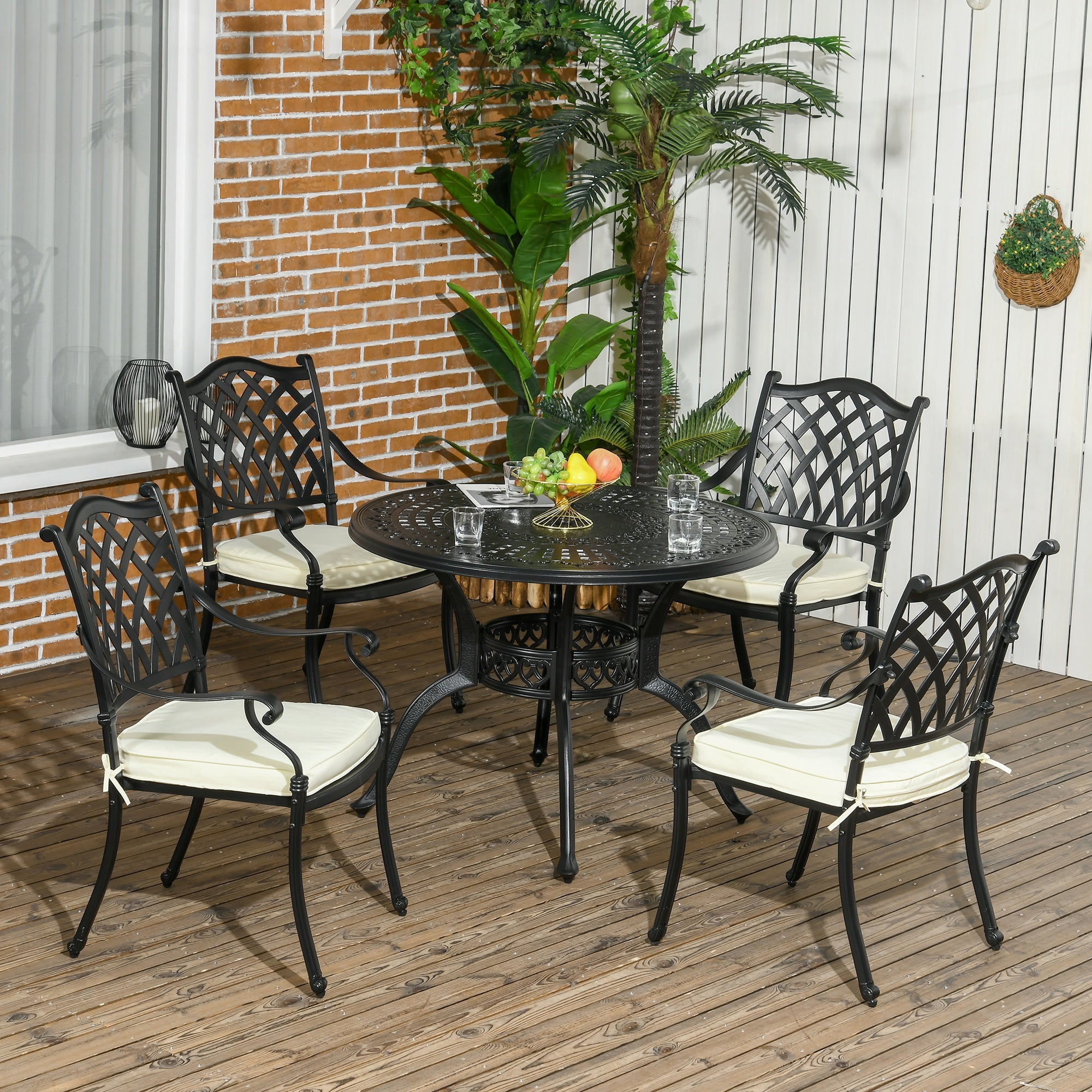 cast iron garden table and 4 chairs