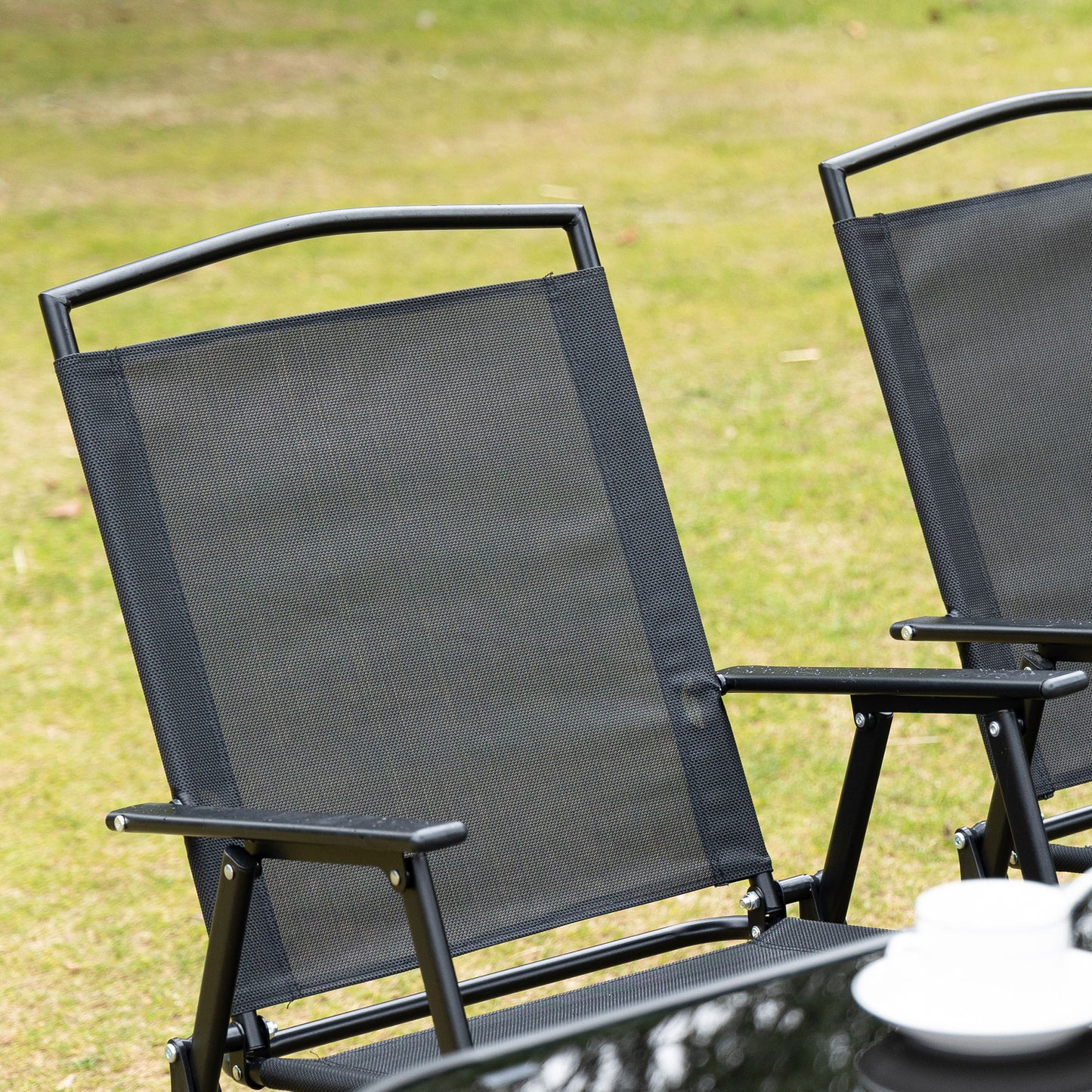 Outsunny 8 Pieces Metal Garden Furniture Set with Parasol and Folding Chairs, Patio Dining Set, 6 Seater Outdoor Table and Chairs with Tempered Glass Top, Black